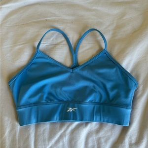 blue reebok racer back sports bra